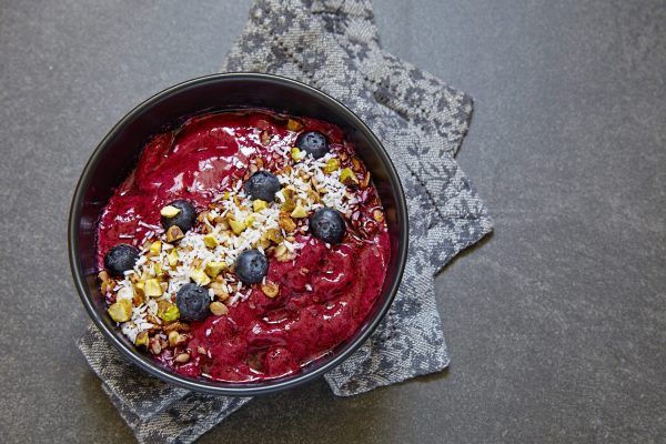 Superfood Avocado Berry Breakfast Bowl with Toasted Nuts